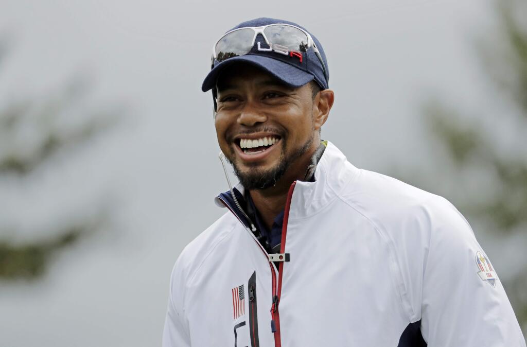 14-time major tournament champion Tiger Woods will not begin his comeback at the PGA Tour event in Napa this week. (Charlie Riedel / Associated Press)