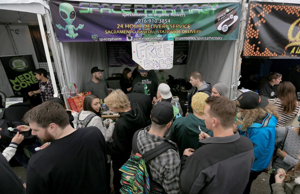 Free samples were a big draw during the Emerald Cup at the Sonoma County Fairgrounds in Santa Rosa, Sunday Dec. 14, 2014. (Kent Porter / Press Democrat)