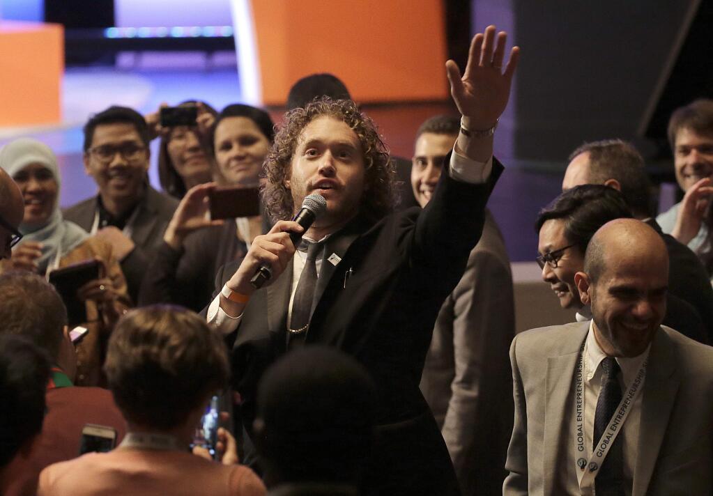 T.J. Miller, a cast member of the television show 'Silicon Valley,' waves at the Global Entrepreneurship Summit in Stanford, Calif., Friday, June 24, 2016. (AP Photo/Jeff Chiu)