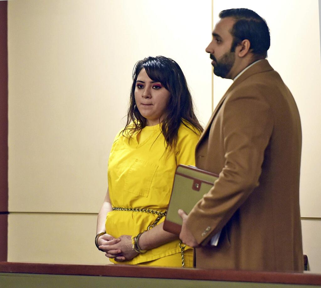 Obdulia Sanchez stands with her attorney, Merced County Public Defender Ramnik Samrao, in Merced Superior Court Tuesday, Jan. 23, 2017. Sanchez pleaded no contest to charges she was driving drunk while livestreaming the July 21, 2017 crash that killed her younger sister. The charges include gross vehicular manslaughter, drunken driving, child endangerment charges and several enhancements. (Vikaas Shanker /The Merced Sun-Star via AP)