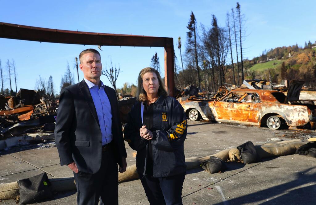 During the Valley fire in 2015, state Sen. Mike McGuire worked with Jodi Traversaro, regional administrator for the California Office of Emergency Services, shown in the Larkfield-Wikiup area after the Tubbs fire. They are now working together again on the rebuilding process following the October 2017 fires. (Christopher Chung/ The Press Democrat)