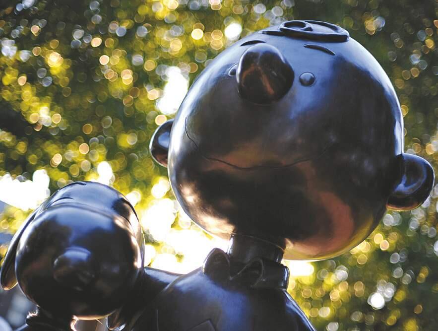 Charlie Brown and Snoopy in permanent embrace as a bronze statue titled, 'Peanuts,' created by artist Stan Pawlowski and located in Depot Park in Railroad Square. July 23, 2010. (Photo: Erik Castro/for Santa Rosa Magazine)