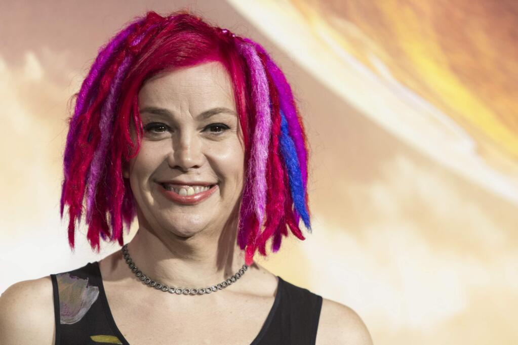 FILE - In this Monday, Feb. 2, 2015 file photo, filmmaker Lana Wachowski attends the premiere of Warner Bros. Pictures' 'Jupiter Ascending' at TCL Chinese Theatre in Los Angeles. The fans have spoken, and the canceled Netflix series 'Sense8' is coming back next year for a two-hour final episode. Netflix and show co-creator Wachowski said Thursday, June 29, 2017, that fan clamor inspired the show's return. (Photo by Paul A. Hebert/Invision/AP, File)