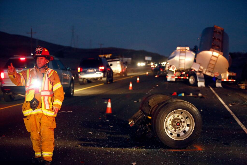 The scene of a fatal multiple vehicle accident involving two tanker trucks and other vehicles in the eastbound lanes of Highway 37 near the intersection of Highway 121, near Schellville, California on Wednesday, November 18, 2015. (Alvin Jornada / The Press Democrat)