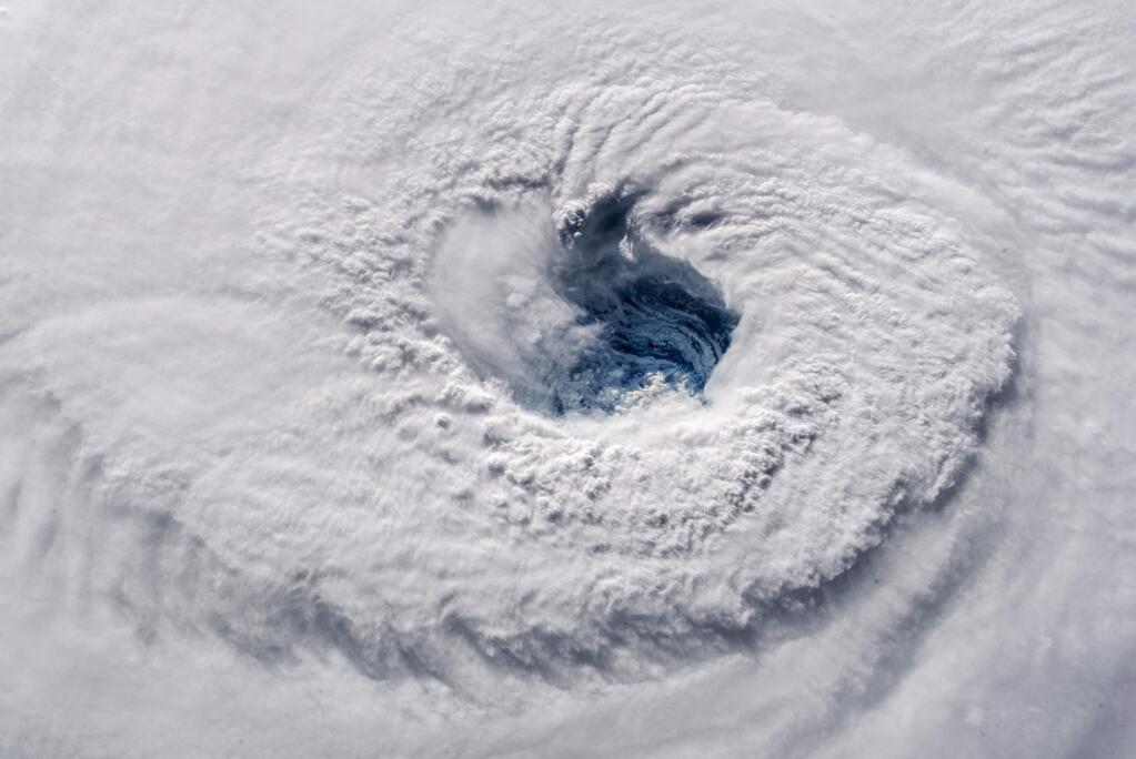 Hurricane Florence churns over the Atlantic Ocean in a NASA photo taken Wednesday.