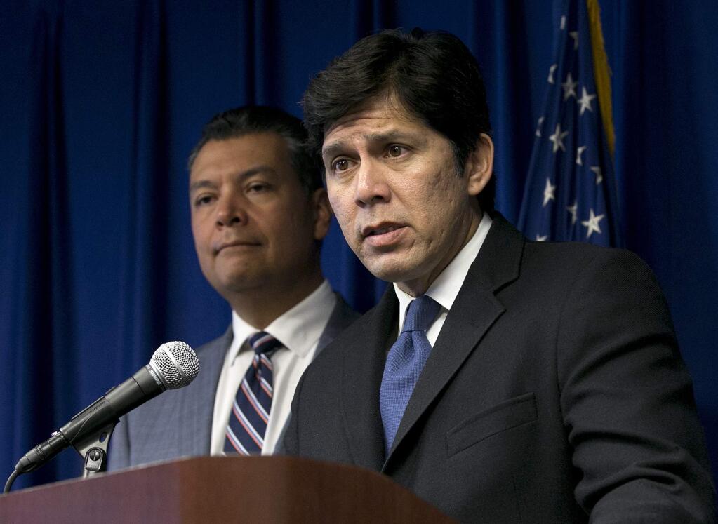 State Senate President Pro Tem Kevin de Leon, D-Los Angeles, right, flanked by Secretary of State Alex Padilla, called President Trump and his advisors cold, compassionless men, as he discussed the president's decision to cancel the Deferred Action for Childhood Arrivals program, at a news conference, Tuesday, Sept. 5, 2017, in Sacramento, Calif. More than 30 California lawmakers vowed to pass bills to help people currently shielded under the DACA program. (AP Photo/Rich Pedroncelli)