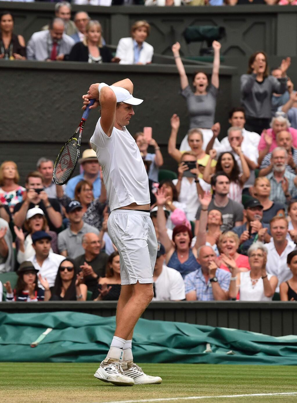 Kevin Anderson of South Africa after defeating John Isner of the US in their men's singles semifinal match at the Wimbledon Tennis Championships, in London, Friday July 13, 2018. (AP Photo/Glyn Kirk, Pool)