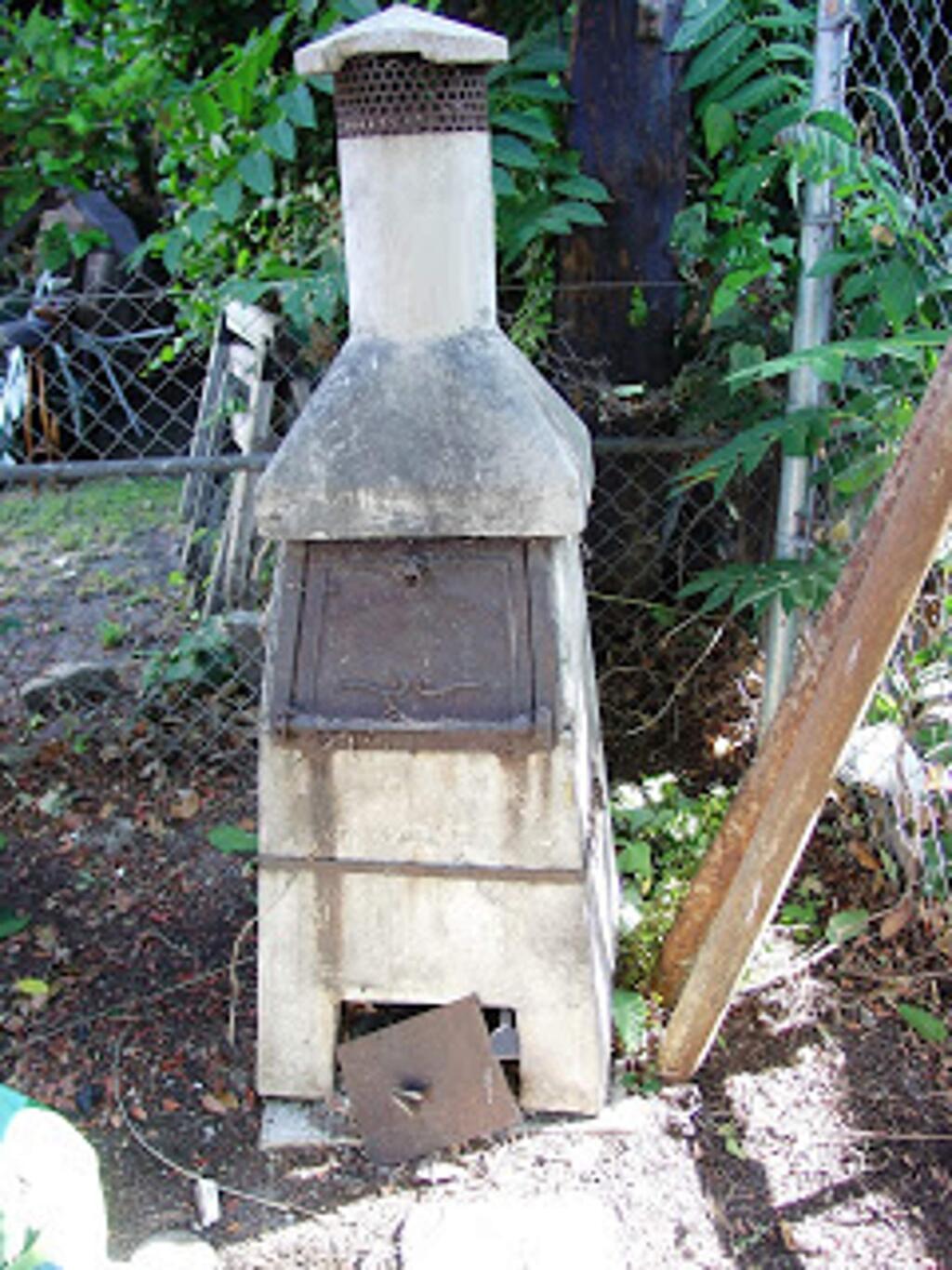 Backyard incinerators such as this one were a common residential appliance before centralized garbage pickup became a thing.