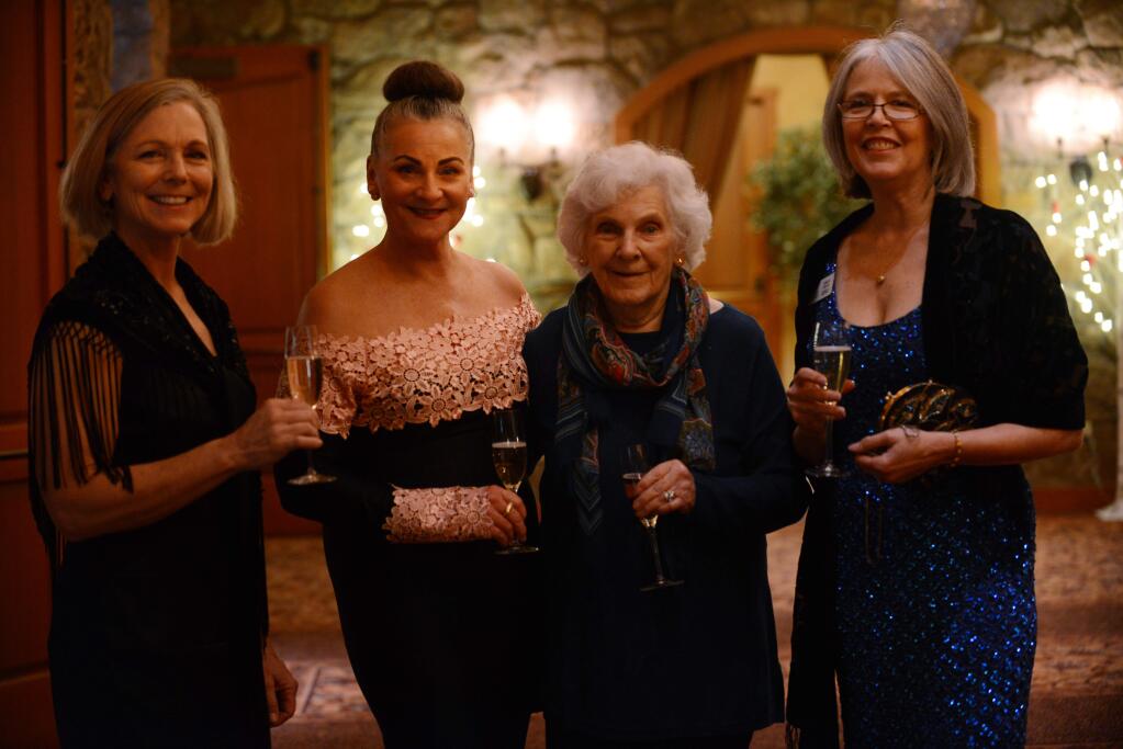 From left, Martha Menth, Monica Menth and Mary Menth with President of Legal Aid of Sonoma County Cindy Craig during the Legal Aid of Sonoma County annual Hearts for Justice Gala held Saturday at John Ash & Co. at the VintnerÕs Inn in Santa Rosa February 25, 2017. (Photo: Erik Castro/for The Press Democrat)