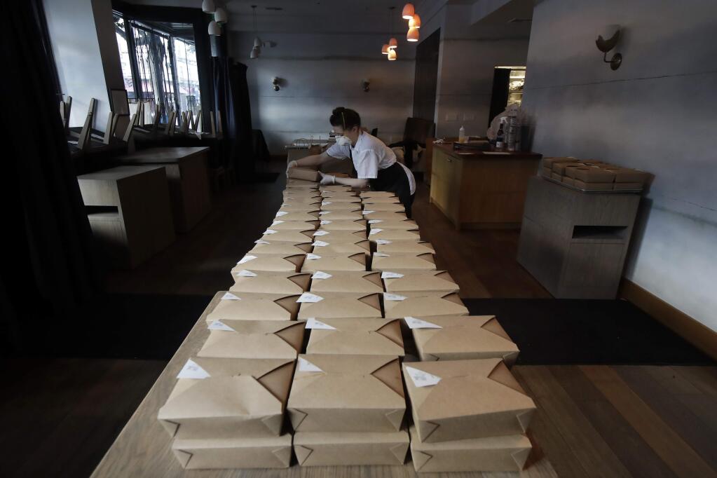 Taxpayers will pay restaurants to make three meals a day for California's millions of seniors during the coronavirus pandemic, Gov. Gavin Newsom announced Friday, April 24. (AP Photo/Jeff Chiu, File)