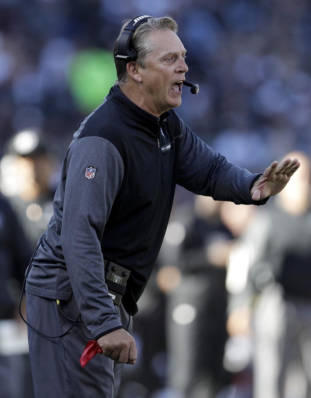 Oakland Raiders head coach Jack Del Rio gestures during the first half of an NFL football game against the New York Giants in Oakland, Calif., Sunday, Dec. 3, 2017. (AP Photo/Marcio Jose Sanchez)