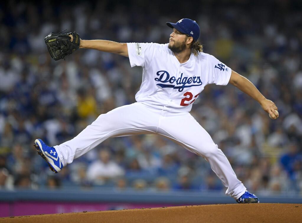 Los Angeles Dodgers starting pitcher Clayton Kershaw throws to an Arizona Diamondbacks batter during the first inning of Game 1 of the baseball team's National League Division Series in Los Angeles, Friday, Oct. 6, 2017. (AP Photo/Mark J. Terrill)