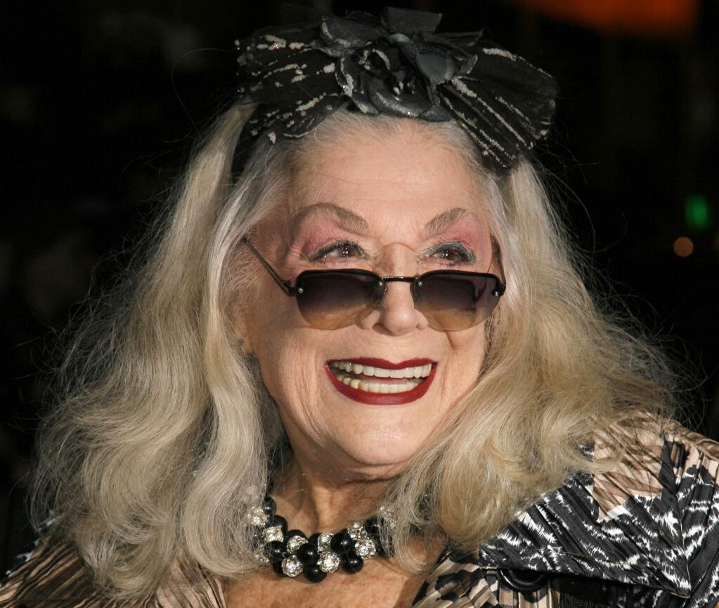 FILE - In this Sunday, Jan. 7, 2007, file photo, Sylvia Miles arrives for the 2006 New York Film Critic's Circle Awards at the Supper Club in New York. Miles, whose brief appearances in “Midnight Cowboy” and “Farewell, My Lovely,” earned her two Academy Award nominations, died Wednesday, June 12, 2019. Miles was also a scene-stealing character of the New York party scene, beloved for her outgoing personality and flamboyant fashion sense. (AP Photo/Rick Maiman, File)