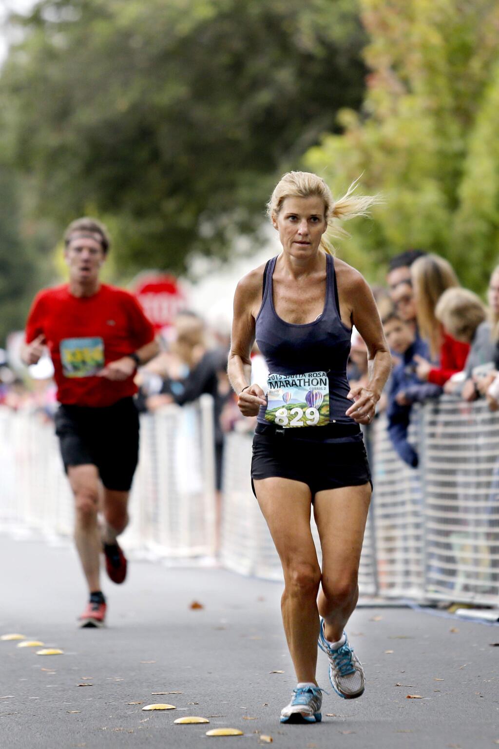 Wendy Jennings approaches the finish line of the Santa Rosa Marathon in Santa Rosa, on Sunday, August 23, 2015. (BETH SCHLANKER/ The Press Democrat)