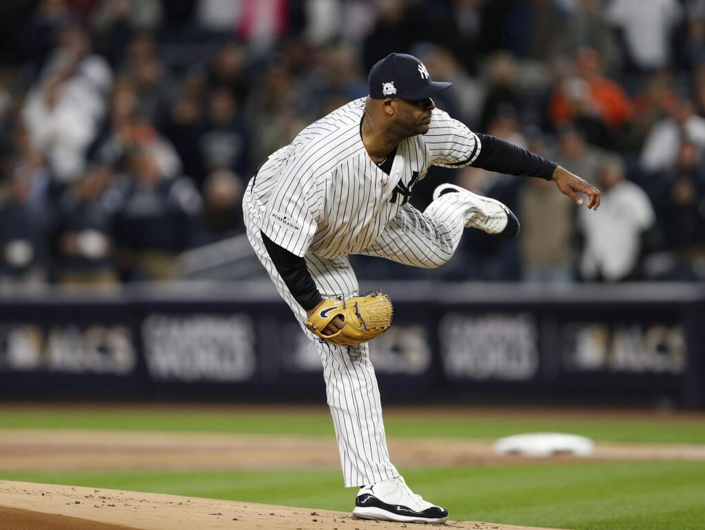 New York Yankees starting pitcher CC Sabathia throws during the first inning of Game 3 of baseball's American League Championship Series against the Houston Astros Monday, Oct. 16, 2017, in New York. (AP Photo/Kathy Willens)