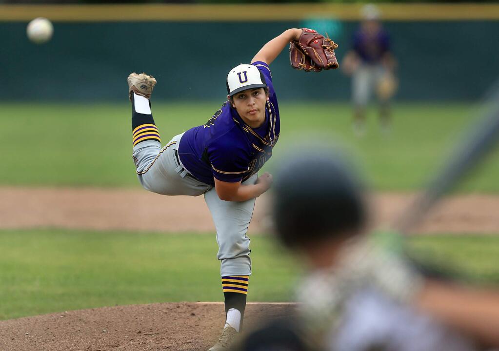 Ukiah's Devin Kirby pitches against Maria Carrillo at Maria Carrillo High School in Santa Rosa, Wednesday May 10, 2017. (Kent Porter / The Press Democrat)