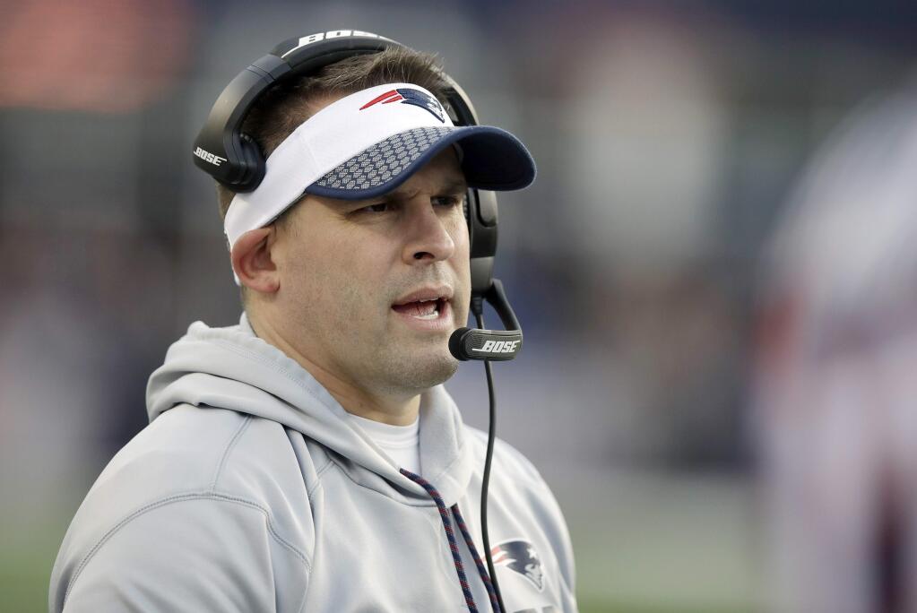 In this Jan. 21, 2018, file photo, New England Patriots offensive coordinator Josh McDaniels watches from the sideline during the first half of the AFC championship game against the Jacksonville Jaguars in Foxborough, Mass. (AP Photo/Charles Krupa, File)