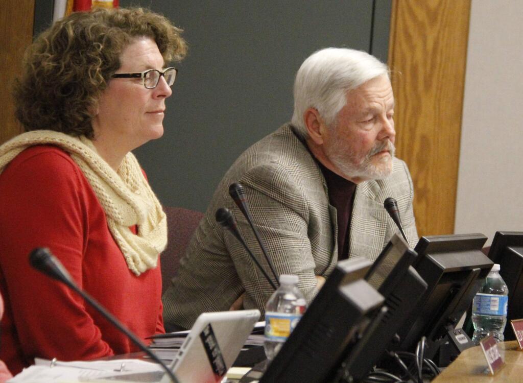 Bill Hoban/Index-TribuneSchool Superintendent Louann Carlomagno and board President Dan Gustafson listen to public comment during the Feb. 14 board meeting.