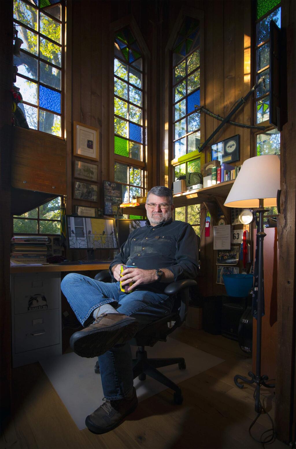Ed Davis, in his study, finds homes for victims of the recent Valley fires. (Photo by Robbi Pengelly/Index-Tribune)