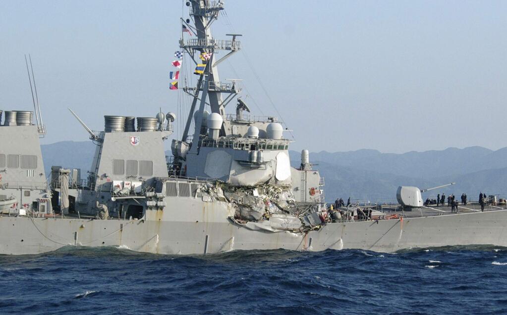 In this photo provided by Japan's 3rd Regional Coast Guard Headquarters, the USS Fitzgerald is seen off Izu Peninsula in, Japan, after the Navy destroyer collided with a merchant ship, Saturday, June 17, 2017. Seven Navy sailors were missing and at least two, including the captain, were injured after the U.S. destroyer collided with a merchant ship off the coast of Japan before dawn Saturday, the U.S. Navy and Japanese coast guard reported. (Japan's 3rd Regional Coast Guard Headquarters via AP)