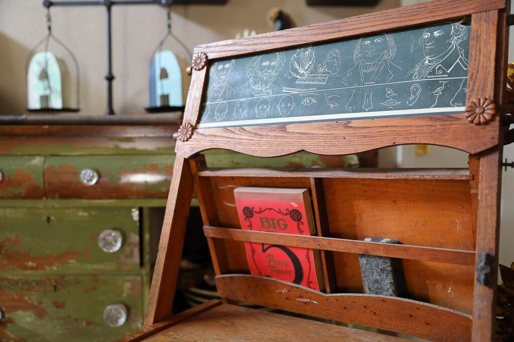 An antique school desk restored by Lori Aguirre.(Christopher Chung/ The Press Democrat)