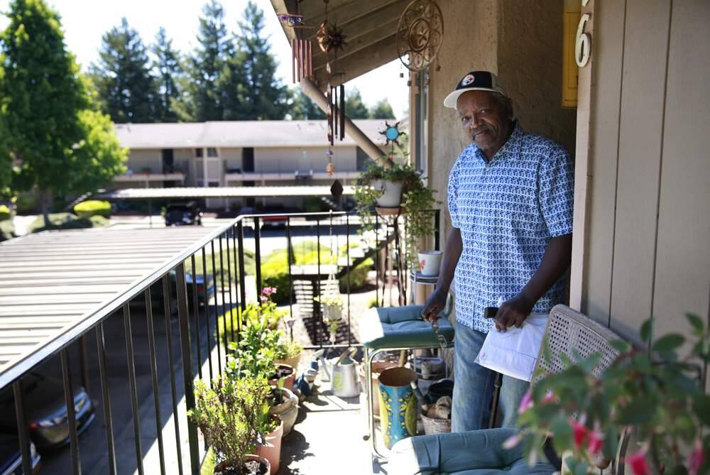 (FILE PHOTO) Resident Lee Roy Wallace in front of his Holly Manor apartment on Wednesday, July 10, 2013 in Rohnert Park, California. About half of the tenants in the apartment complex depend on federal housing subsidies. (BETH SCHLANKER/ The Press Democrat)