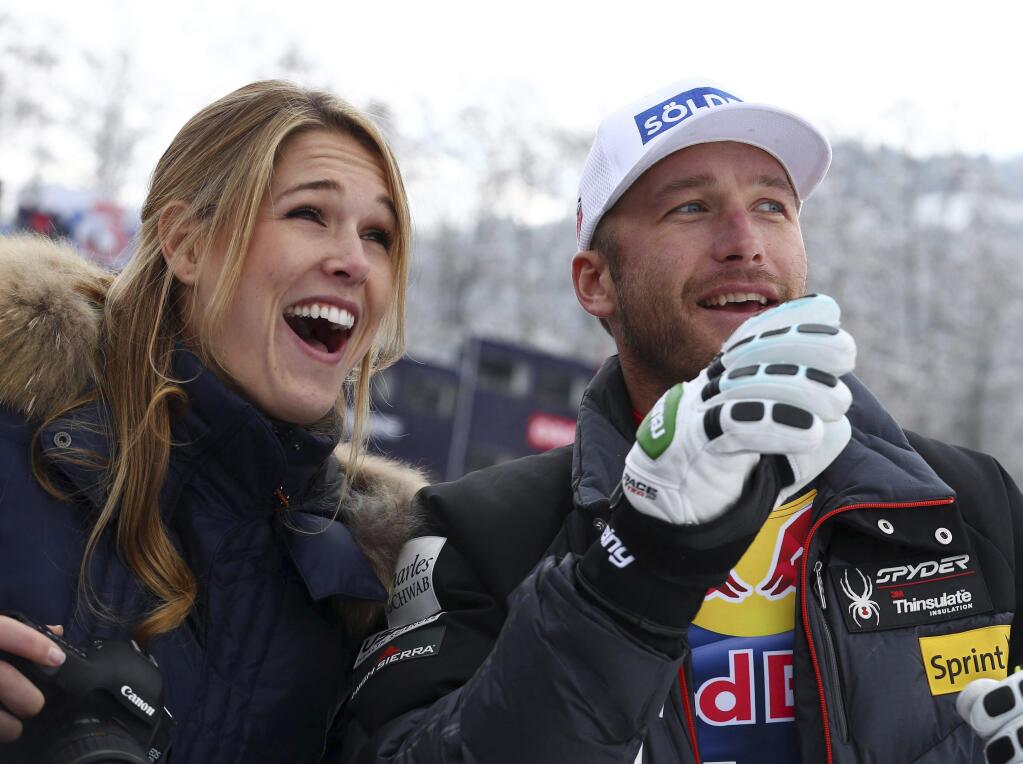 FILE - In this Jan. 25, 2014 file photo, Bode Miller and his wife Morgan smile at the men's World Cup downhill in Kitzbuehel, Austria. Authorities reported Monday, June 11, 2018, that the couple's 19-month-old daughter Emeline Miller died Sunday after paramedics pulled her from a swimming pool in Coto de Caza, Calif., Saturday. Capt. Tony Bommarito of the Orange County Fire Authority Bommarito says they were unable to revive her and she was later pronounced dead. (AP Photo/Giovanni Auletta, File)