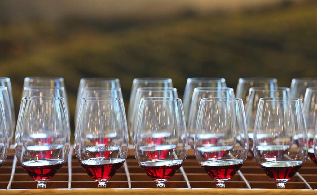 Glasses of wine are poured and ready for judging at the Sonoma County Harvest Fair Wine Competition in Santa Rosa on Tuesday, Sept. 17, 2019.(Christopher Chung/ The Press Democrat)