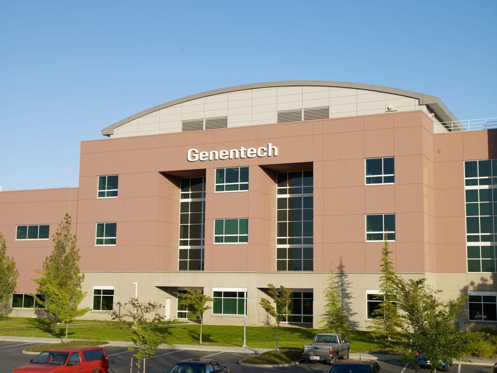 The exterior of the Genentech main building at the Vacaville campus, which houses two cell-culture plants used to develop a number of drug therapies to treat cancer, multiple sclerosis, hives and allergic symptoms. The company also continues to explore and develop drugs for treating Parkinson's and Alzheimer's diseases. June 2017. (Gary Quackenbush / For North Bay Business Journal)