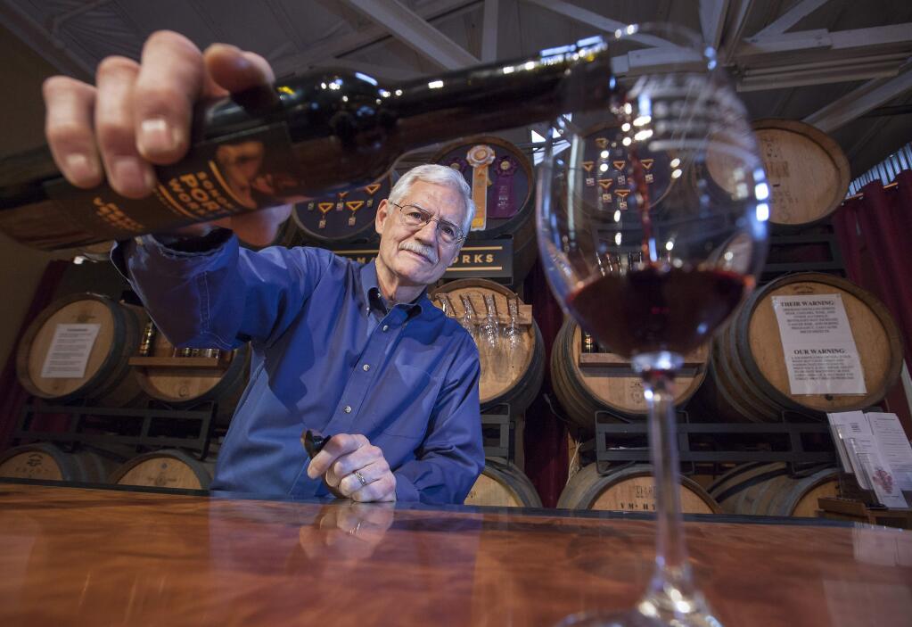 IT WAS A PORT AND STORMY NIGHT: Bill Reading pours vino by day, and spins yarns by night.