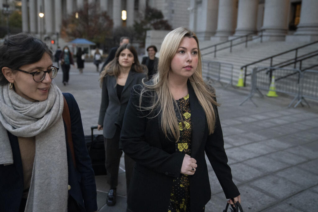 Publicist Haleigh Breest leaves court after screenwriter and film director Paul Haggis was found guilty in a sexual assault civil lawsuit, Thursday, Nov. 10, 2022, in New York. (AP Photo/John Minchillo)