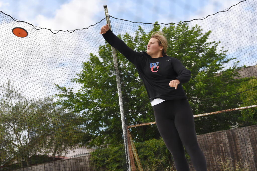 West County senior Ellie Roan warms up before competing in the discus during the North Bay League Track and Field Championships at Piner High School in Santa Rosa on Friday, May 6, 2022. (Erik Castro / for The Press  Democrat)