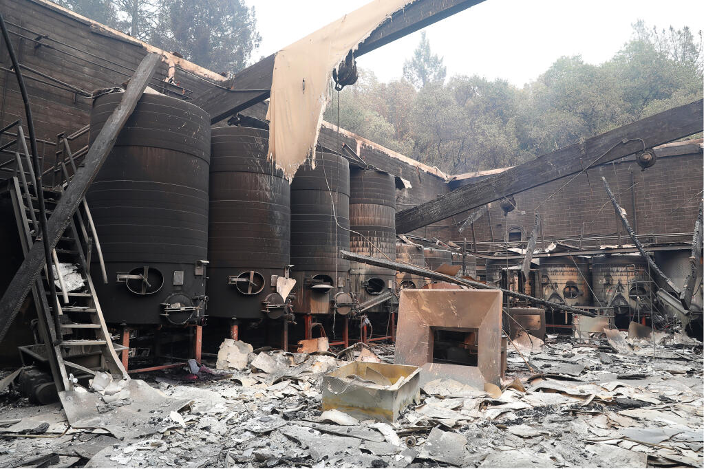 Damaged steel tanks at Fairwinds Estate Winery in St. Helena on Tuesday, September 29, 2020.  (Christopher Chung/ The Press Democrat)