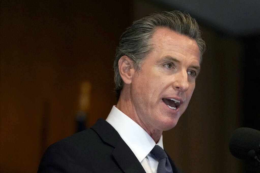 FILE - On Tuesday, Sept. 28, 2021, Gov. Gavin Newsom signed a law that makes it legal for the use of medicinal cannabis in a health care facility. (AP Photo/Jeff Chiu, File)