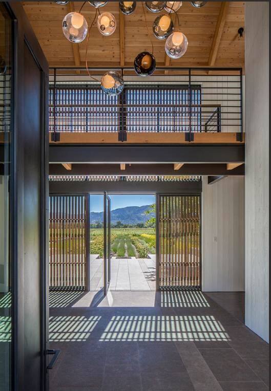 Architect Melanie Turner included this catwalk in her design to create a separation between the working and living spaces in a Napa Valley home.  (Art Gray)