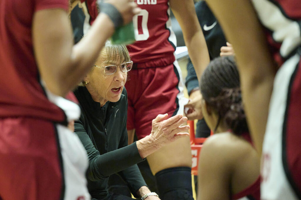 Stanford head coach Tara VanDerveer talks to her players during a timeout in the second half of Sunday’s game at Portland. (Troy Wayrynen / ASSOCIATED PRESS)
