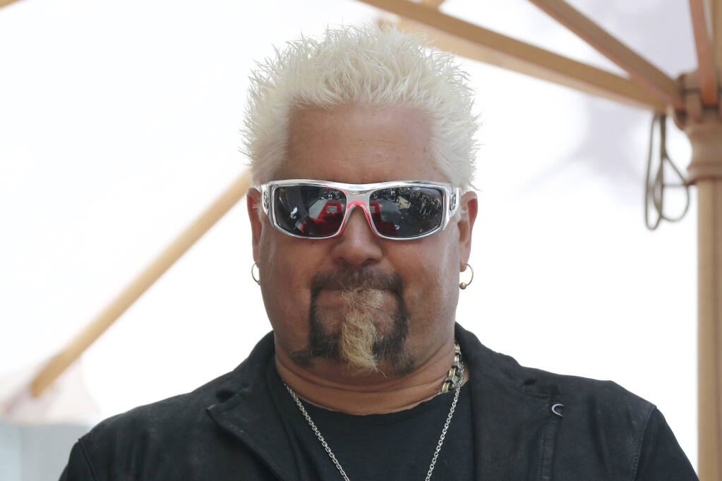 Guy Fieri attends a ceremony honoring him with a star at the Hollywood Walk of Fame on Wednesday, May 22, 2019, in Los Angeles. (Photo by Willy Sanjuan/Invision/AP)