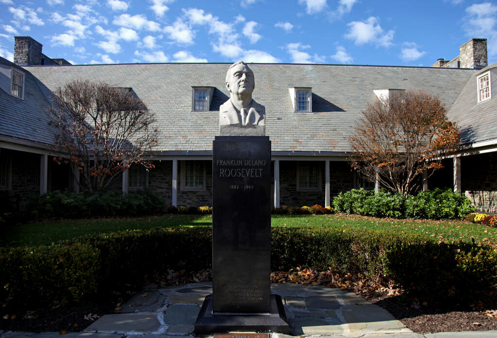 A bust of President Franklin D. Roosevelt in front of the Franklin D. Roosevelt Presidential Library and Museum in Hyde Park, New York. (CRAIG RUTTLE / Associated Press)