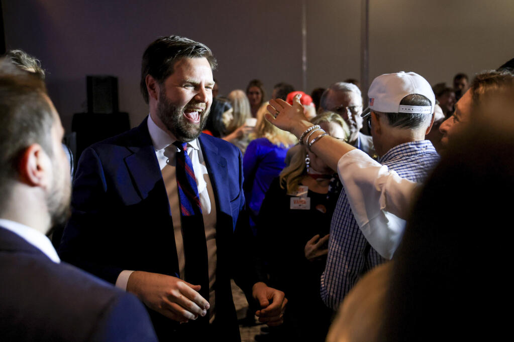 Republican Senate candidate JD Vance greets supporters during an election night watch party, Tuesday, May 3, 2022, in Cincinnati. Vance won Ohio’s contentious and hyper-competitive GOP Senate primary, buoyed by Donald Trump’s endorsement  in a race widely seen as an early test of the former president’s hold on his party. (AP Photo/Aaron Doster)