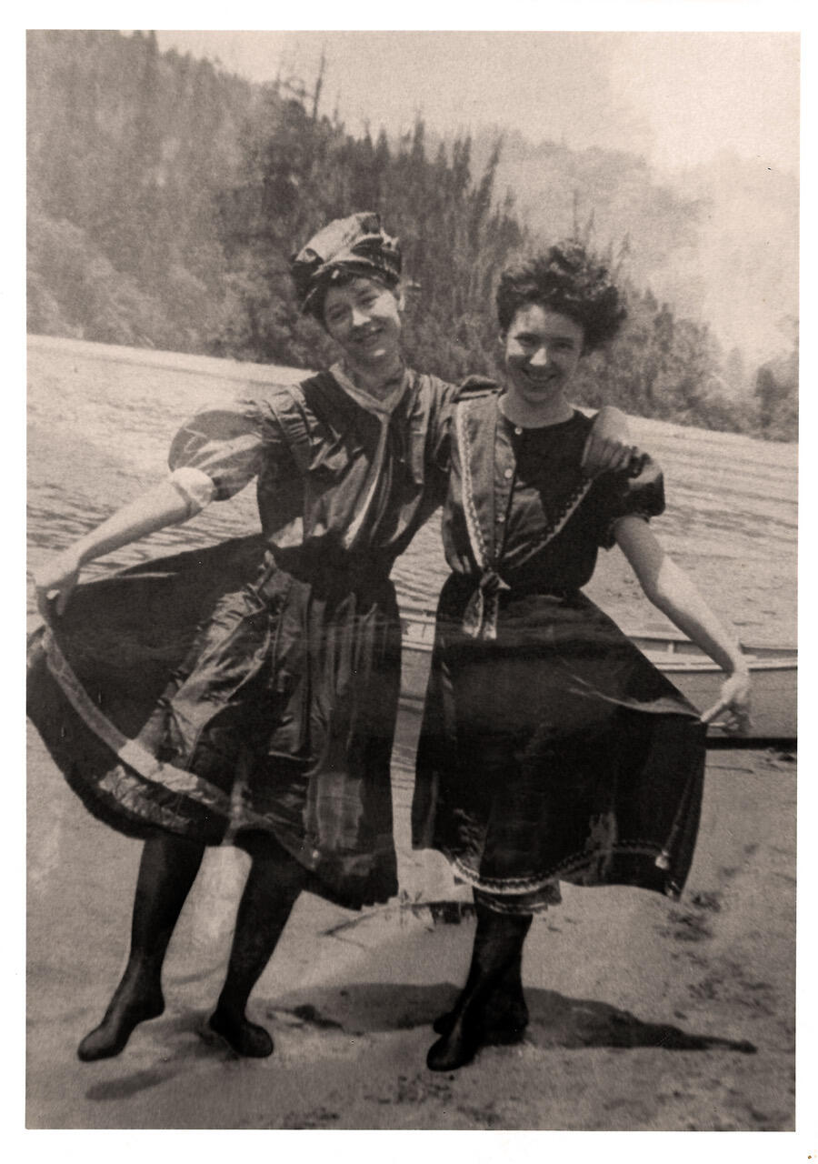 Ruby Burris, left, secretary to Northwestern Pacific Railroad land agent Frank Latham, wears a bathing suit at the Russian River and stands arm-in-arm with an unidentified smiling woman sometime between 1905 and 1907. Jane Barry, president of the Russian River Historical Society, calls this photo “Bathing Beauties” and says it is one of her favorites. (Russian River Historical Society)