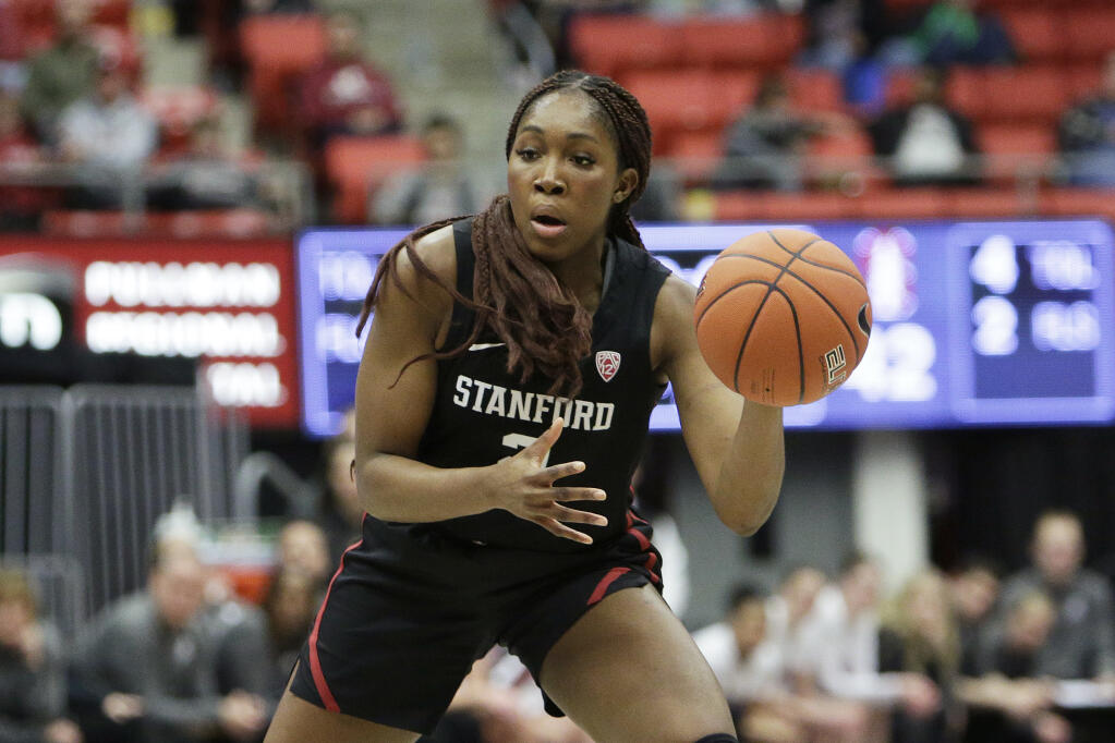 Stanford guard Agnes Emma-Nnopu passes the ball during the second half of an NCAA college basketball game against Washington State, Friday, Feb. 3, 2023, in Pullman, Wash. (AP Photo/Young Kwak)