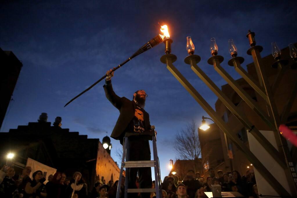Lighting of the Mega Menorah for Chanukah at the Petaluma River in 2019. This year’s event will take place at the Petaluma Fairgrounds. (BETH SCHLANKER/PRESS DEMOCRAT)