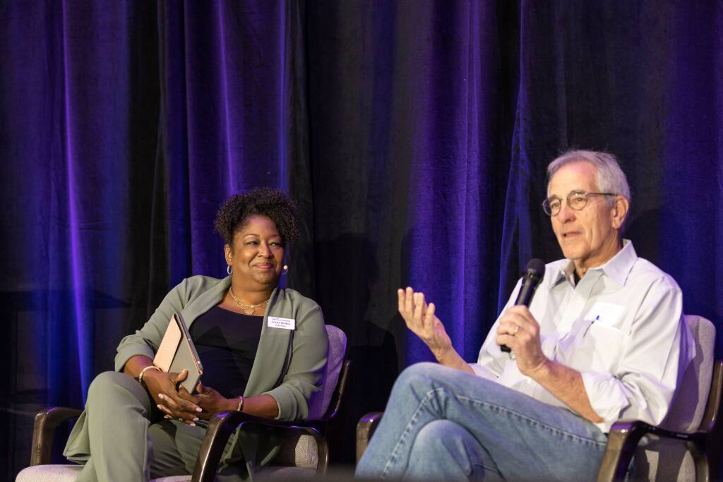 North Bay Business Journal Publisher Lorez Bailey discusses sustainability in the wine industry with Ridgely Evers, owner of DaVero Farms and Winery, on Tuesday at the Journal’s 22nd annual Wine Industry Conference in Santa Rosa.  (Loren Hansen Photography)