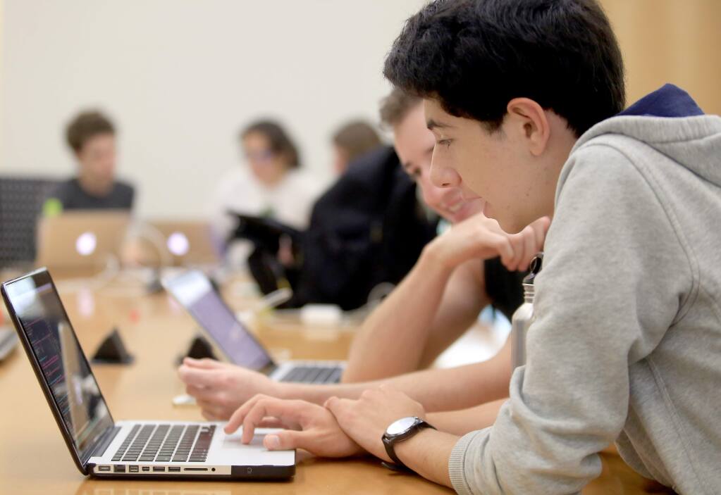 High schooler Alexander (Alex) Katz, right, works with SSU student Ryan Kelez on a research project as part of Sonoma State University's Ship program at Salazar Hall on the SSU campus in Rohnert Park, Tuesday Aug. 5, 2014. (Kent Porter / Press Democrat) 2014