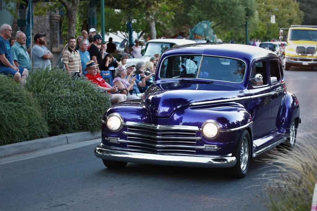 More than 200 cars cruise Cloverdale Boulevard during the 26th Annual Cloverdale Car and Motorcycle Show in Cloverdale, California on Friday, Sept. 6, 2019. (WILL BUCQUOY/ FOR THE PD)