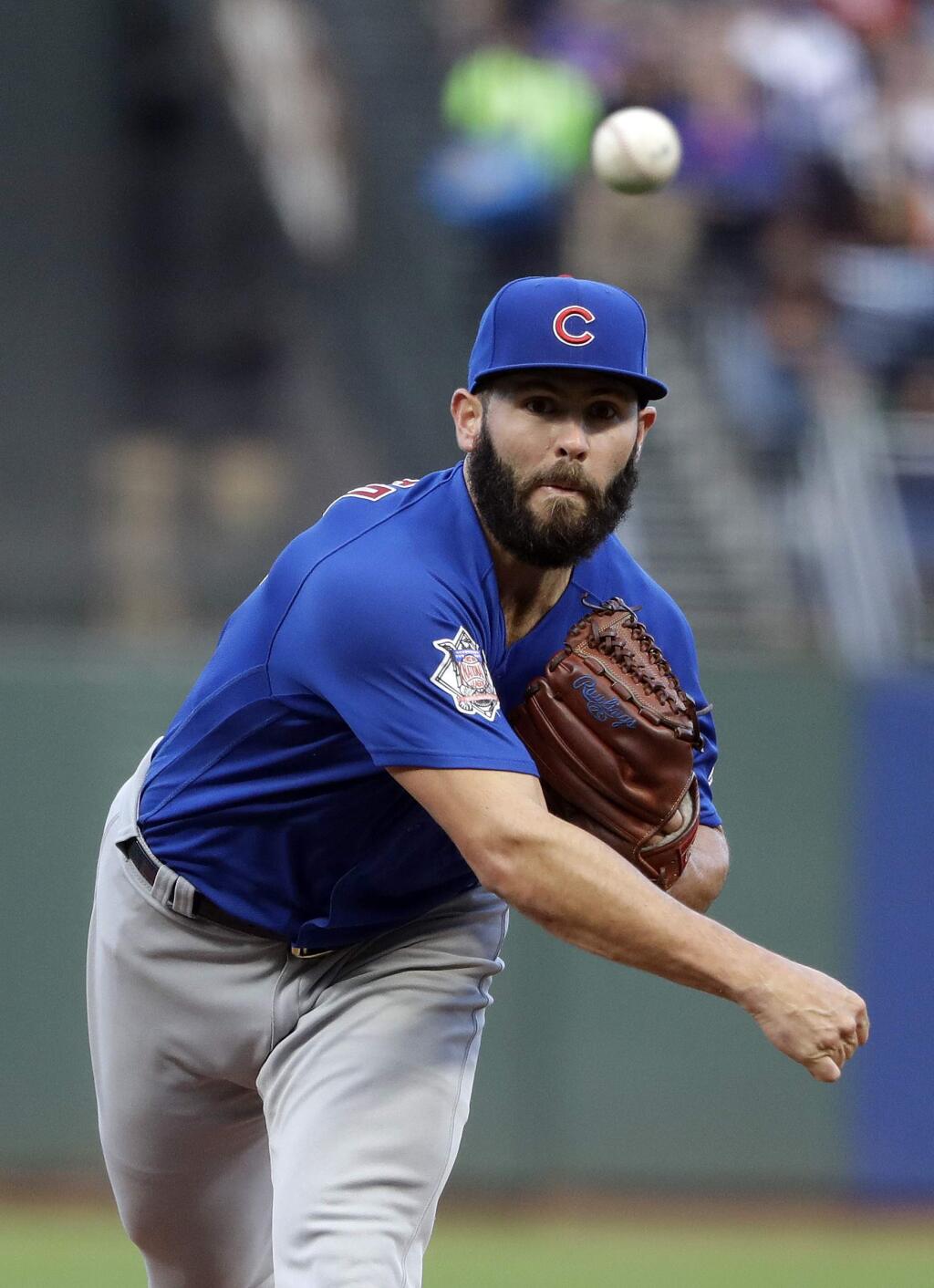 Chicago Cubs starting pitcher Jake Arrieta throws to the San Francisco Giants during the first inning of a baseball game Monday, Aug. 7, 2017, in San Francisco. (AP Photo/Marcio Jose Sanchez)