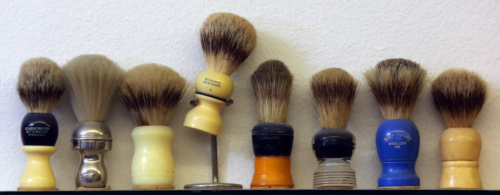 Barber Shop in Santa Rosa has a collection of shaving brushes. (JOHN BURGESS / The Press Democrat)