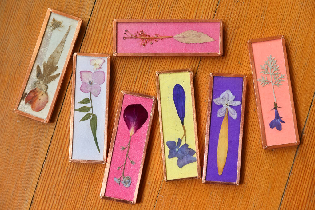 Dried flowers make pretty magnets. (Christopher Chung / The Press Democrat)