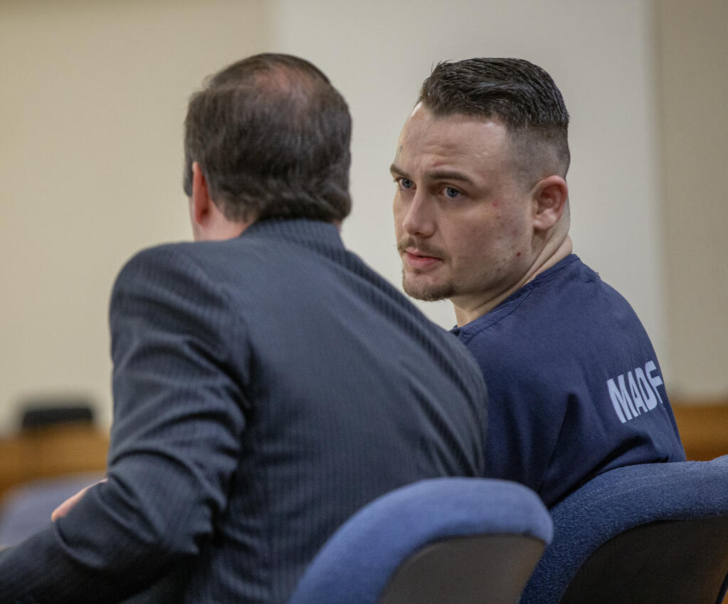 Skyler Rasmussen, right, talks to defense attorney Evan Zelig during his preliminary hearing at Sonoma County Superior Court in Santa Rosa, Friday, Sept. 1, 2023. Rasmussen has been charged with multiple felony counts in the December 2022 death of Palms Inn resident William Woodard. (Chad Surmick / The Press Democrat)