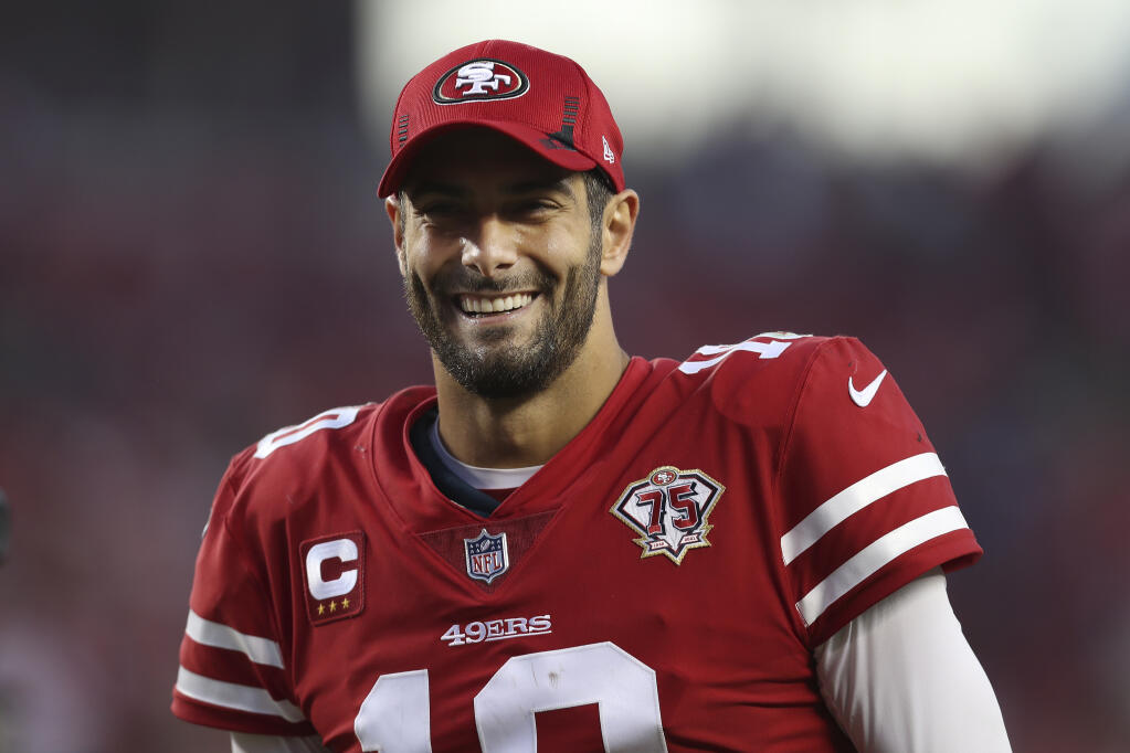 San Francisco 49ers quarterback Jimmy Garoppolo smiles after the team defeated the Minnesota Vikings in Santa Clara on Sunday, Nov. 28, 2021. (Jed Jacobsohn / ASSOCIATED PRESS)